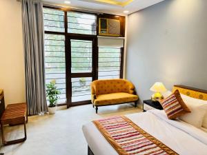 Posezení v ubytování Grove Residency Hauz Khas Couple Friendly New Delhi