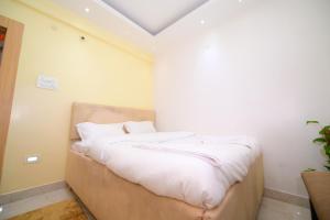 Hotel Airport residency客房内的一张或多张床位