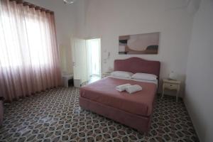 Gallery image of Vista Mare Rooms in Porto Cesareo +19 photos