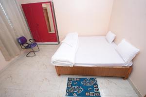 Hotel Airport residency客房内的一张或多张床位