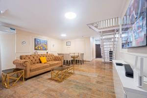 TV a/nebo společenská místnost v ubytování Lagos best apartment