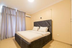 Postel nebo postele na pokoji v ubytování Lagos best apartment