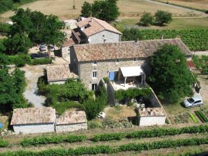 an aerial view of a house in a field at La Nichoule in Rosières