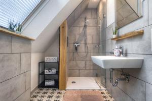 Ένα μπάνιο στο Ferienwohnung Landquartier