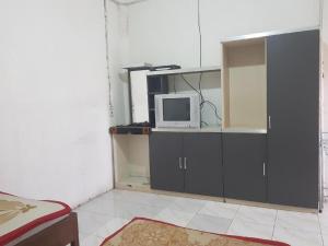 Η κουζίνα ή μικρή κουζίνα στο Hotel O Triarga