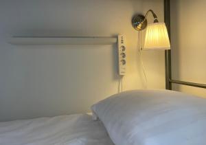 Postel nebo postele na pokoji v ubytování Crafoord Place Hostel