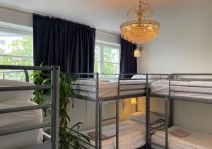 Postel nebo postele na pokoji v ubytování Crafoord Place Hostel