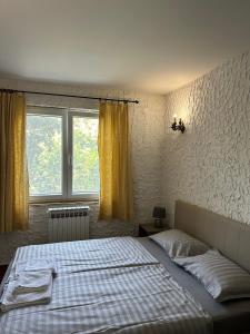 Posteľ alebo postele v izbe v ubytovaní Secret garden house