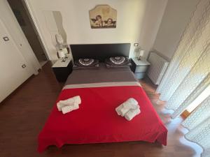 A bed or beds in a room at Dimora 14