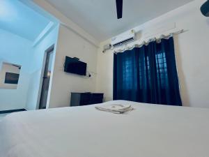 TV a/nebo společenská místnost v ubytování Solo Ace Hotel