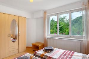 Postel nebo postele na pokoji v ubytování Haus Marion