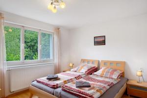 Postel nebo postele na pokoji v ubytování Haus Marion