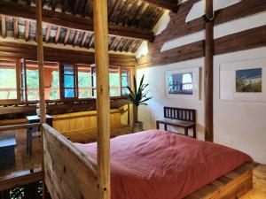 Postel nebo postele na pokoji v ubytování Secret Moon Guesthouse
