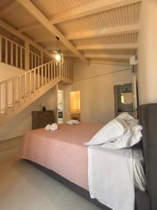 Postel nebo postele na pokoji v ubytování Dimitris Apartments