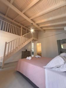 Postel nebo postele na pokoji v ubytování Dimitris Apartments