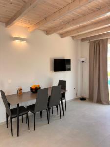 TV a/nebo společenská místnost v ubytování Dimitris Apartments