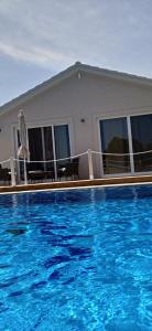 Bazén v ubytování Dimitris Apartments nebo v jeho okolí