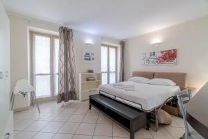 Posteľ alebo postele v izbe v ubytovaní Piazza Statuto Functional Studio