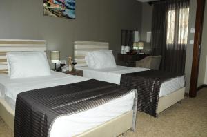 Postel nebo postele na pokoji v ubytování Adana City Boutique Hotel