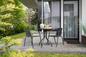 Vonkajšia záhrada v ubytovaní Apartamenty pod Orłem - Rezydencja Modern + 14 fotografií