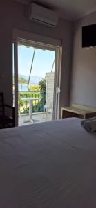 Postel nebo postele na pokoji v ubytování Elena Hotel
