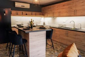 Kuchyň nebo kuchyňský kout v ubytování Tsiaras House