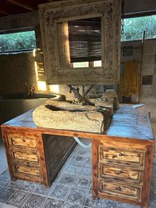 a large wooden desk with a sink in a room at Cortijo Boutique Marbella in Marbella