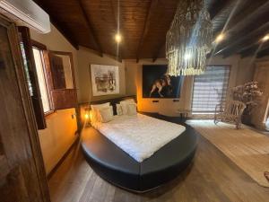 a bedroom with a large bed in a room at Cortijo Boutique Marbella in Marbella