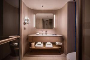 Bilik mandi di Orange Crystal Hotel MixC Shantou East Coast