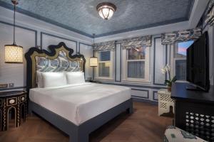 Cama ou camas em um quarto em Hagia Sofia Mansions Istanbul, Curio Collection by Hilton