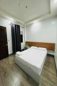 Postel nebo postele na pokoji v ubytování Hotel Ramon