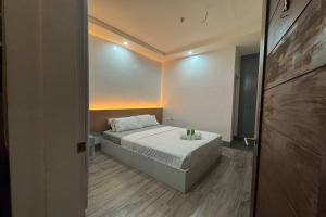 Postel nebo postele na pokoji v ubytování Hotel Ramon