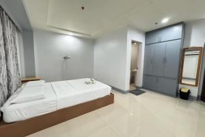 Postel nebo postele na pokoji v ubytování Hotel Ramon
