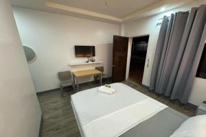 TV a/nebo společenská místnost v ubytování Hotel Ramon + 20 fotografií