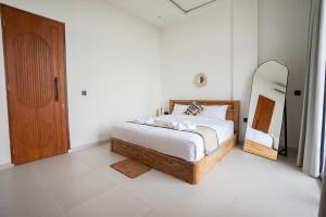 Ένα ή περισσότερα κρεβάτια σε δωμάτιο στο The Mirea Guest House +29 φωτογραφίες