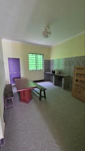 a room with a table and a bench in it at Angkor note residence in Siem Reap +11 photos