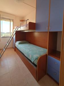 Postel nebo postele na pokoji v ubytování Appartamento Isola Verde Chioggia