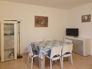 TV a/nebo společenská místnost v ubytování Appartamento Isola Verde Chioggia