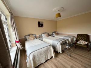Postel nebo postele na pokoji v ubytování Breagagh View B&B