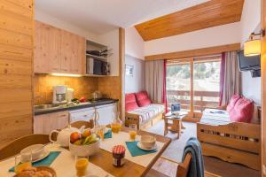 Køkken eller tekøkken på Résidence Pierre & Vacances Les Sentiers du Tueda