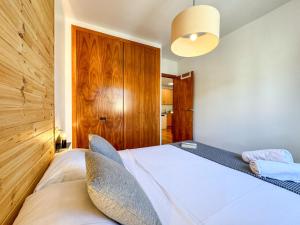 เตียงในห้องที่ Molina Molinísimo