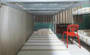 Voodi või voodid majutusasutuse Rcee Place by RedDoorz toas