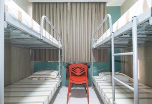 Voodi või voodid majutusasutuse Rcee Place by RedDoorz toas