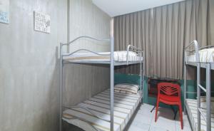 Voodi või voodid majutusasutuse Rcee Place by RedDoorz toas