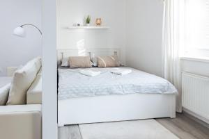Postel nebo postele na pokoji v ubytování Apartmán v Srdci Náchoda
