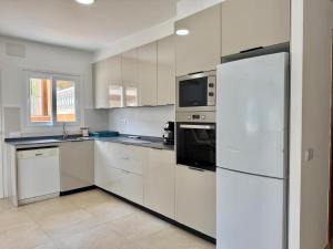 Kuchyň nebo kuchyňský kout v ubytování Villa Bellavista Calpe