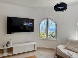 TV a/nebo společenská místnost v ubytování Villa Bellavista Calpe