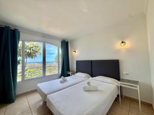 Postel nebo postele na pokoji v ubytování Villa Bellavista Calpe