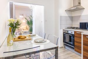 Kuchyň nebo kuchyňský kout v ubytování Apartmán v Srdci Náchoda