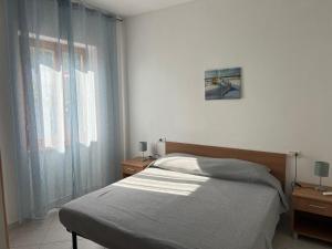 Katil atau katil-katil dalam bilik di Appartamento Marisa3 a soli 200mt dal mare